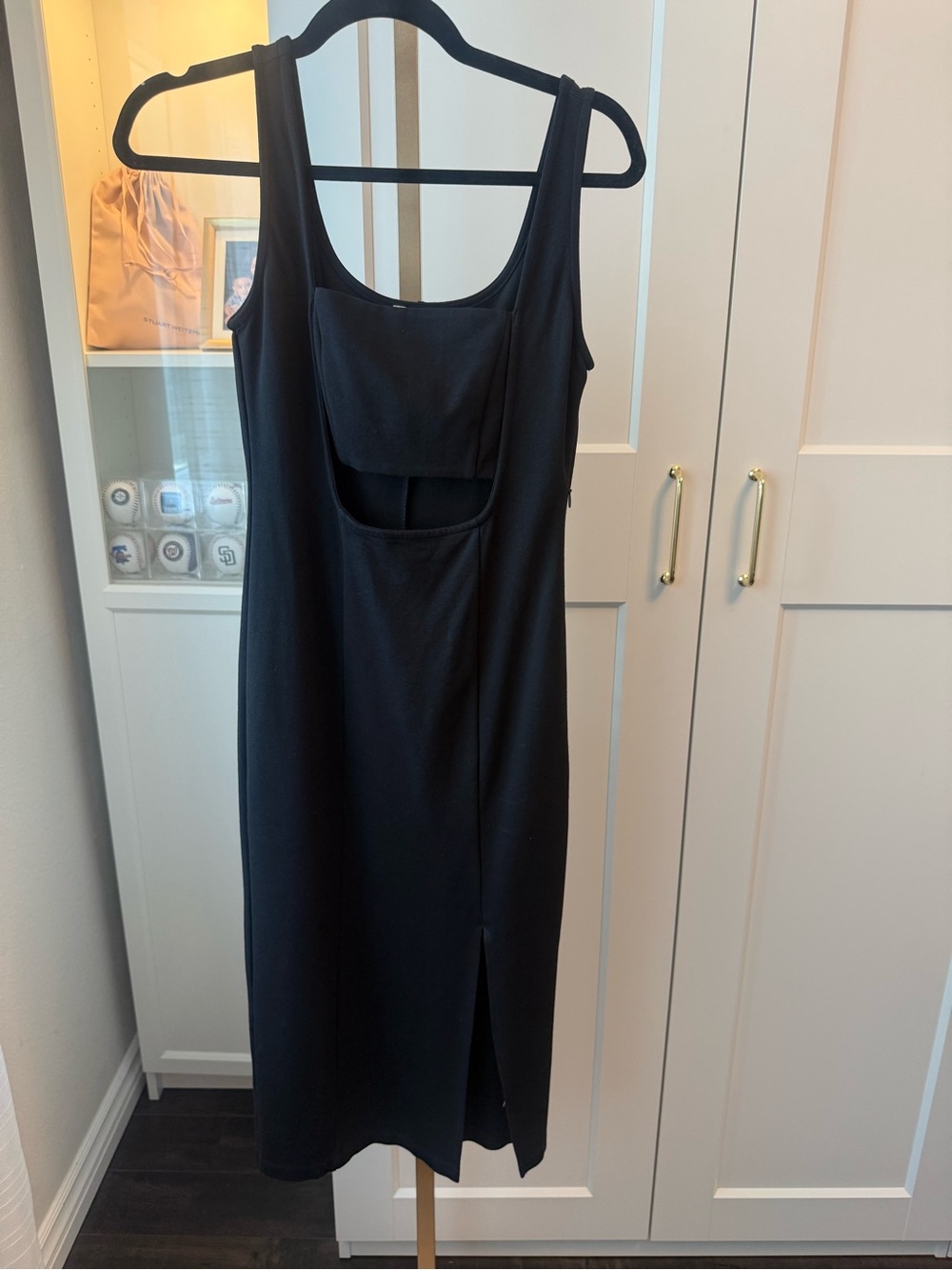 Elegant Black Midi Dress with Front Cutout